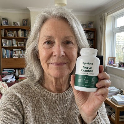 Customer holding a bottle of AgeMend Nerve Comfort
