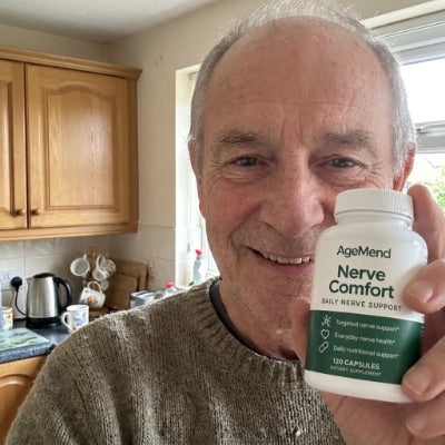 Customer holding a bottle of AgeMend Nerve Comfort
