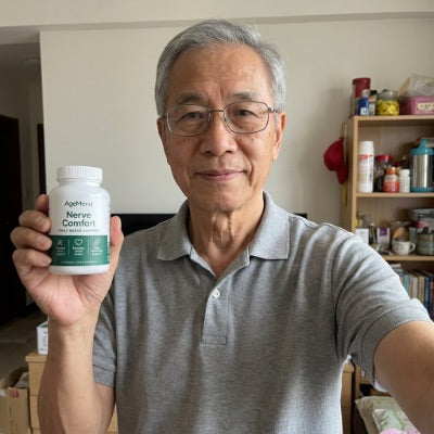 Customer holding a bottle of AgeMend Nerve Comfort