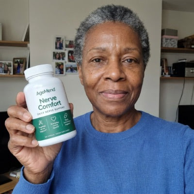 Customer holding a bottle of AgeMend Nerve Comfort